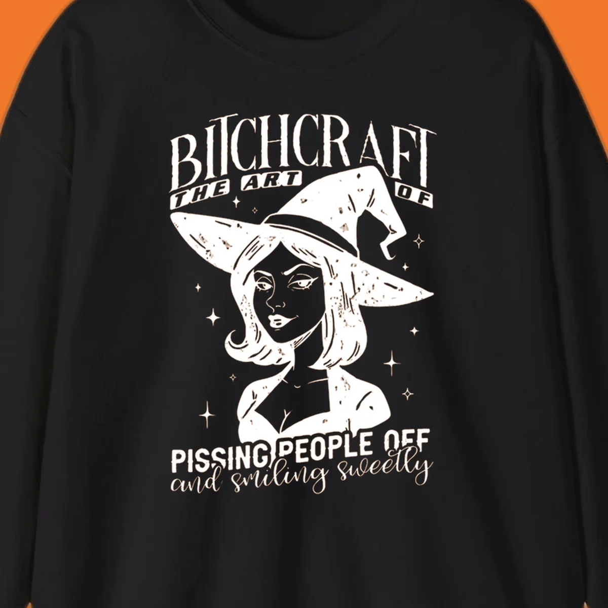 Illustration of a witch with the text Bitchcraft The Art Of Pissing People Off and smiling sweetly.