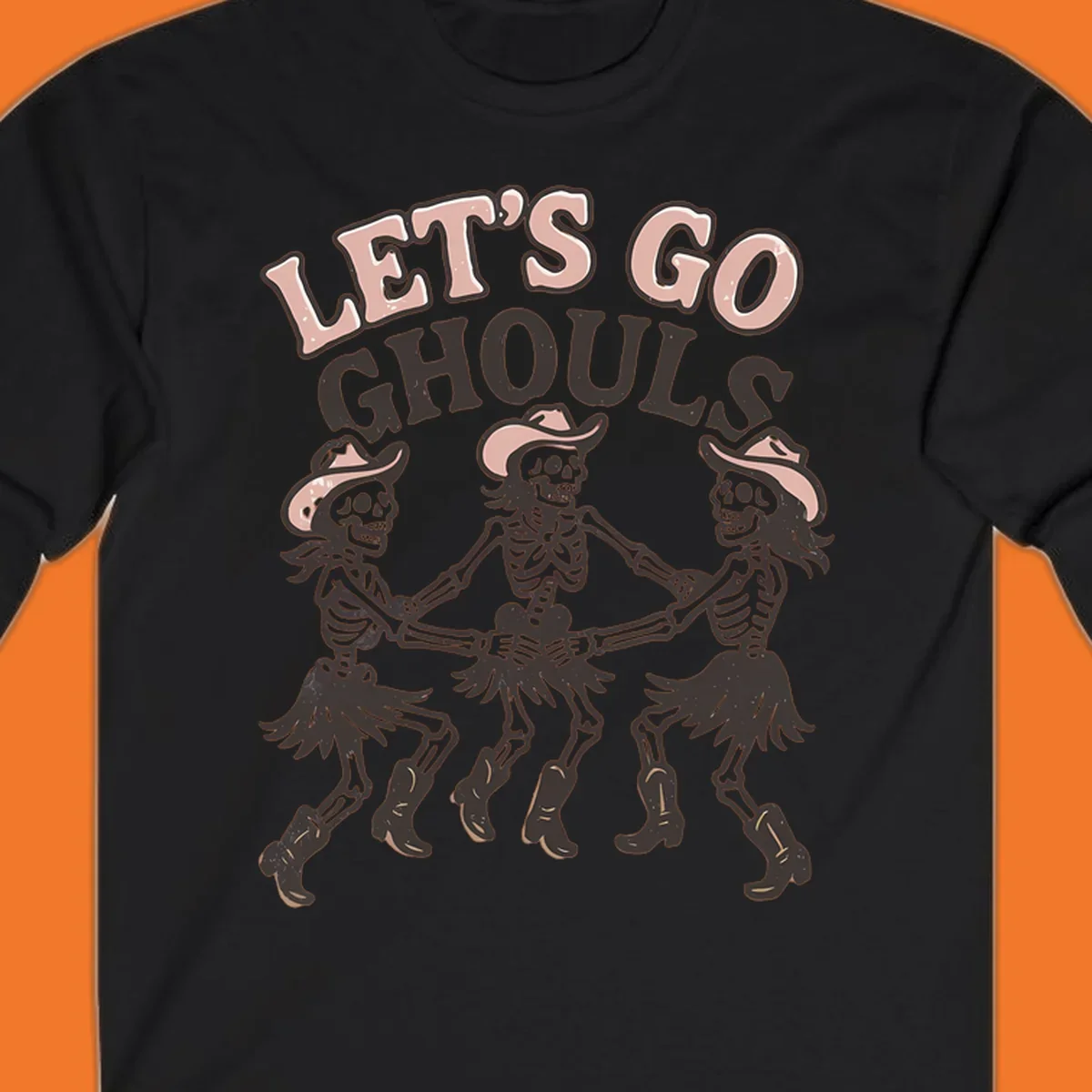 Lets Go Ghouls text with three dancing skeletons in cowboy attire.