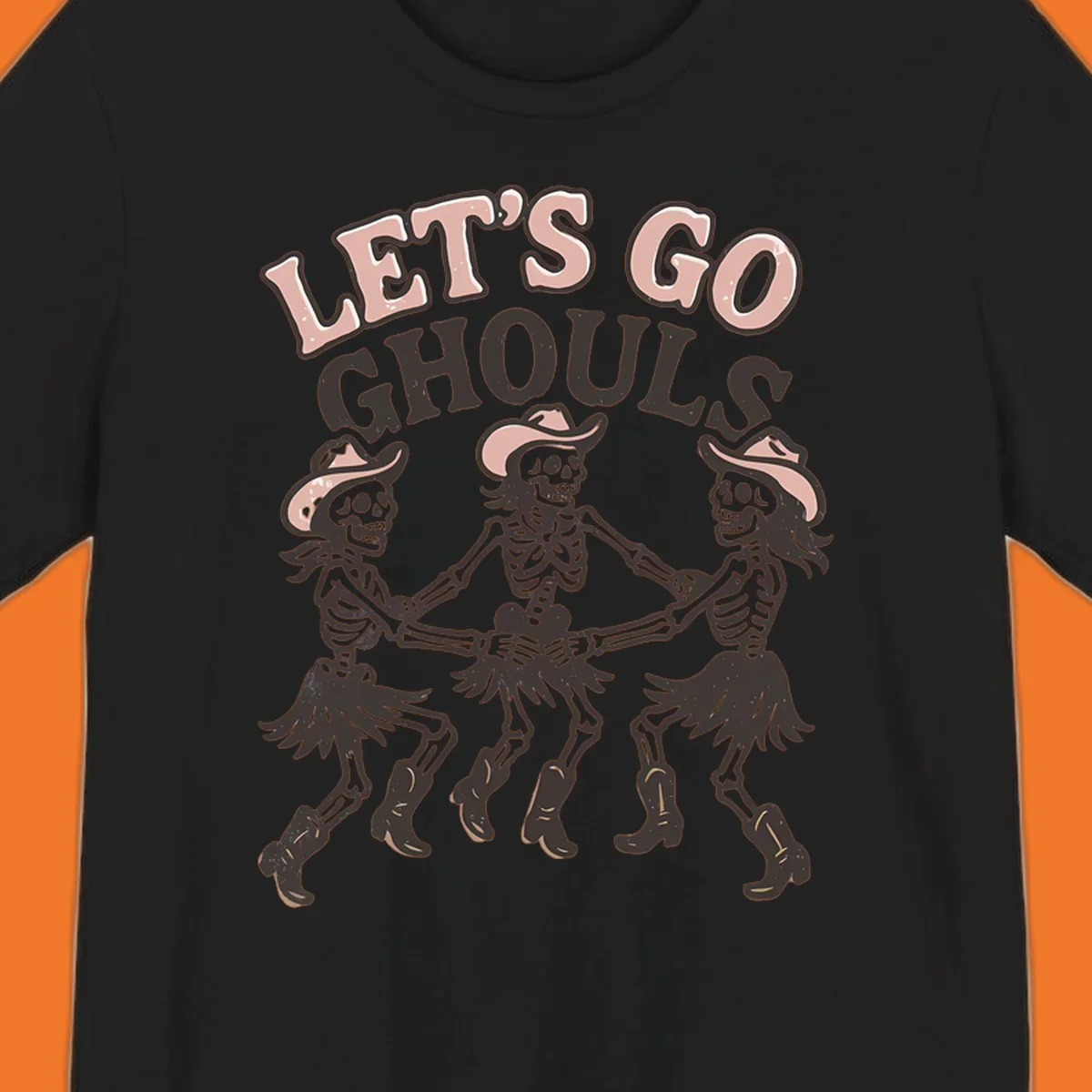 Lets Go Ghouls text with three dancing skeletons in cowboy attire.