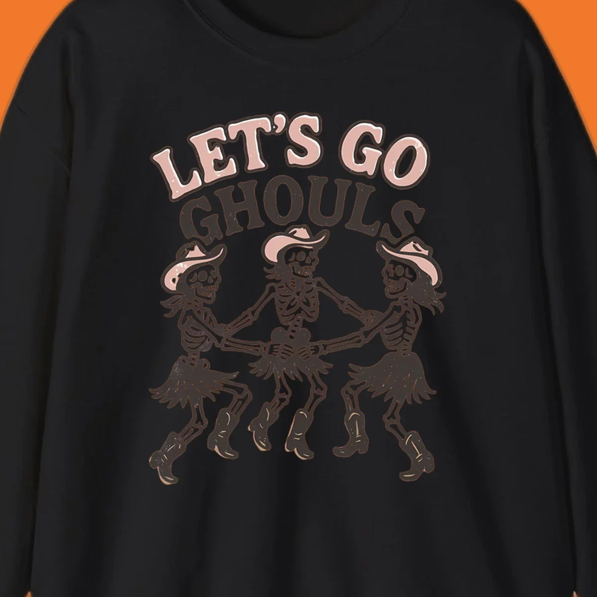 Lets Go Ghouls text with three dancing skeletons in cowboy attire.