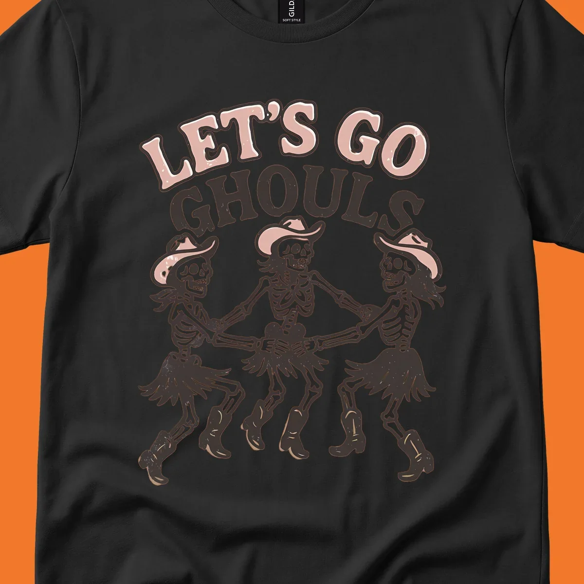 Lets Go Ghouls text with three dancing skeletons in cowboy attire.