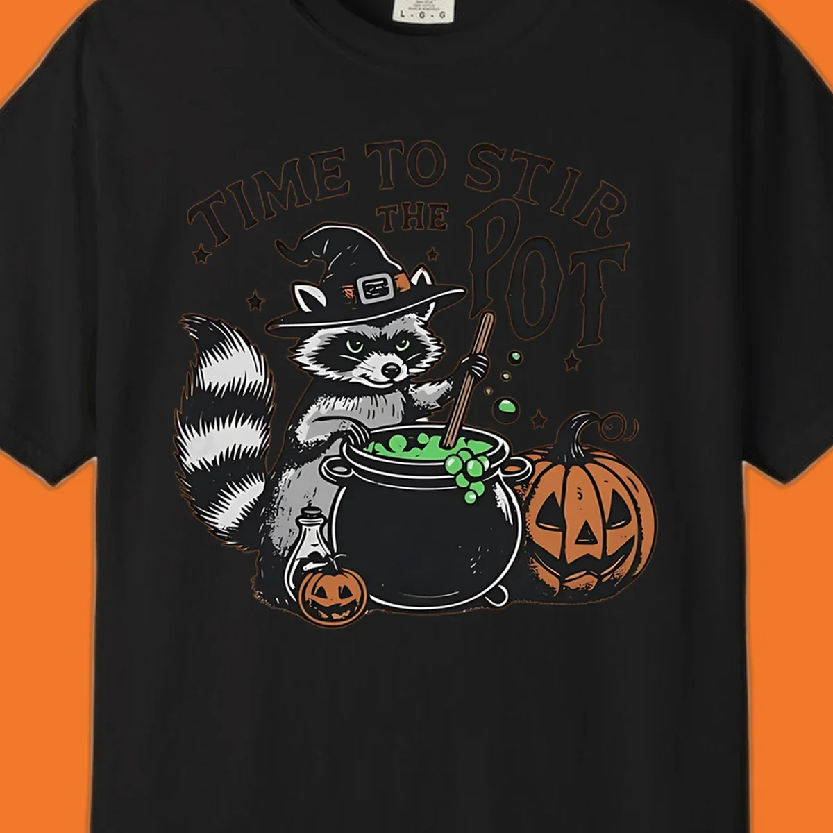 Raccoon witch stirring a halloween pot, text says TIME TO STIR THE POT.