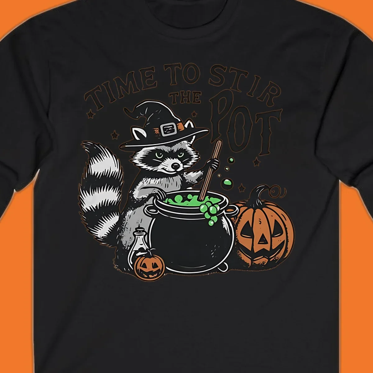 Raccoon witch stirring a halloween pot, text says TIME TO STIR THE POT.