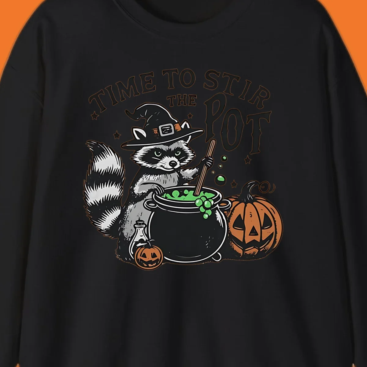 Raccoon witch stirring a halloween pot, text says TIME TO STIR THE POT.
