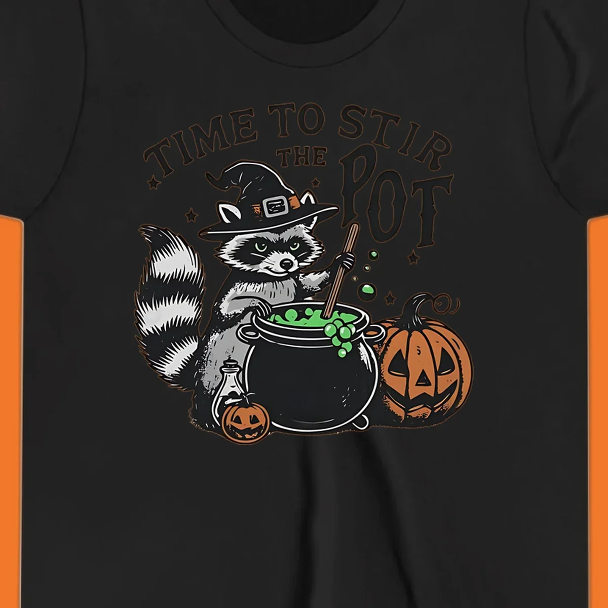 Raccoon witch stirring a halloween pot, text says TIME TO STIR THE POT.