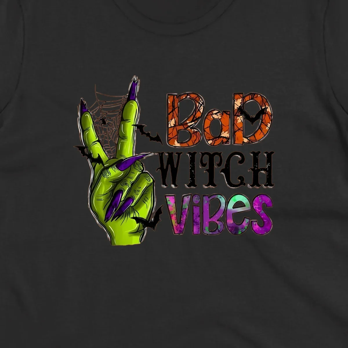 Bad Witch Vibes Halloween graphic with a green witch hand peace sign and bats.