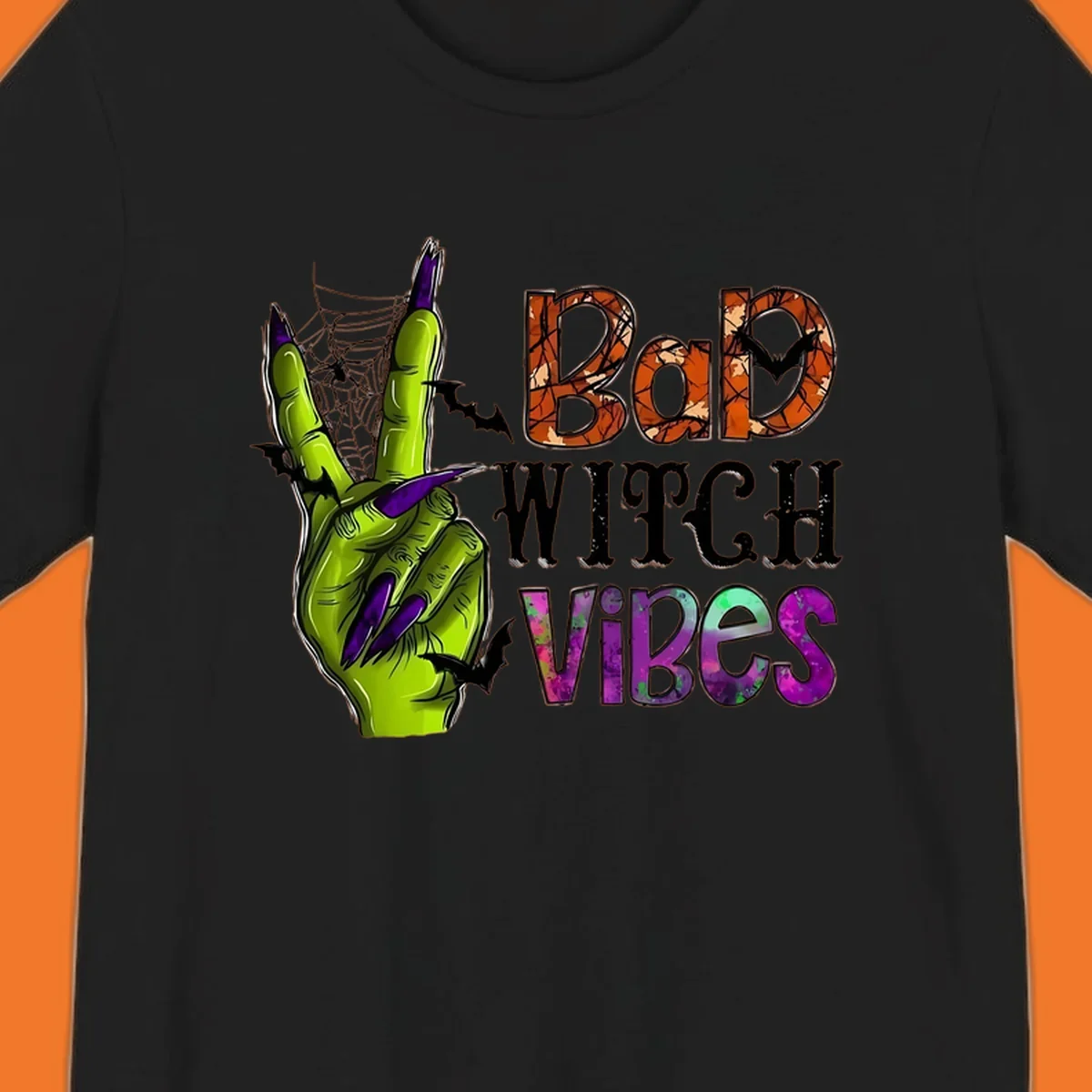 Bad Witch Vibes Halloween graphic with a green witch hand peace sign and bats.