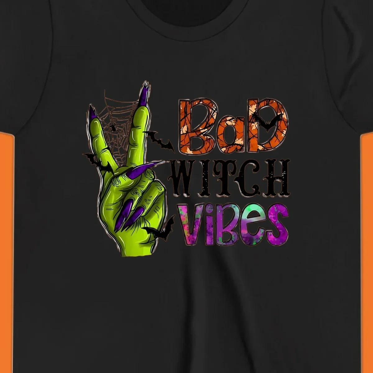 Bad Witch Vibes Halloween graphic with a green witch hand peace sign and bats.