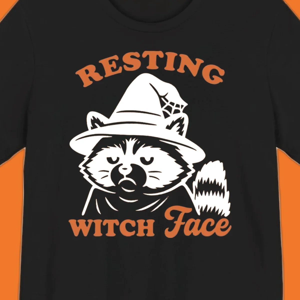 Resting Witch Face raccoon Halloween design with text.