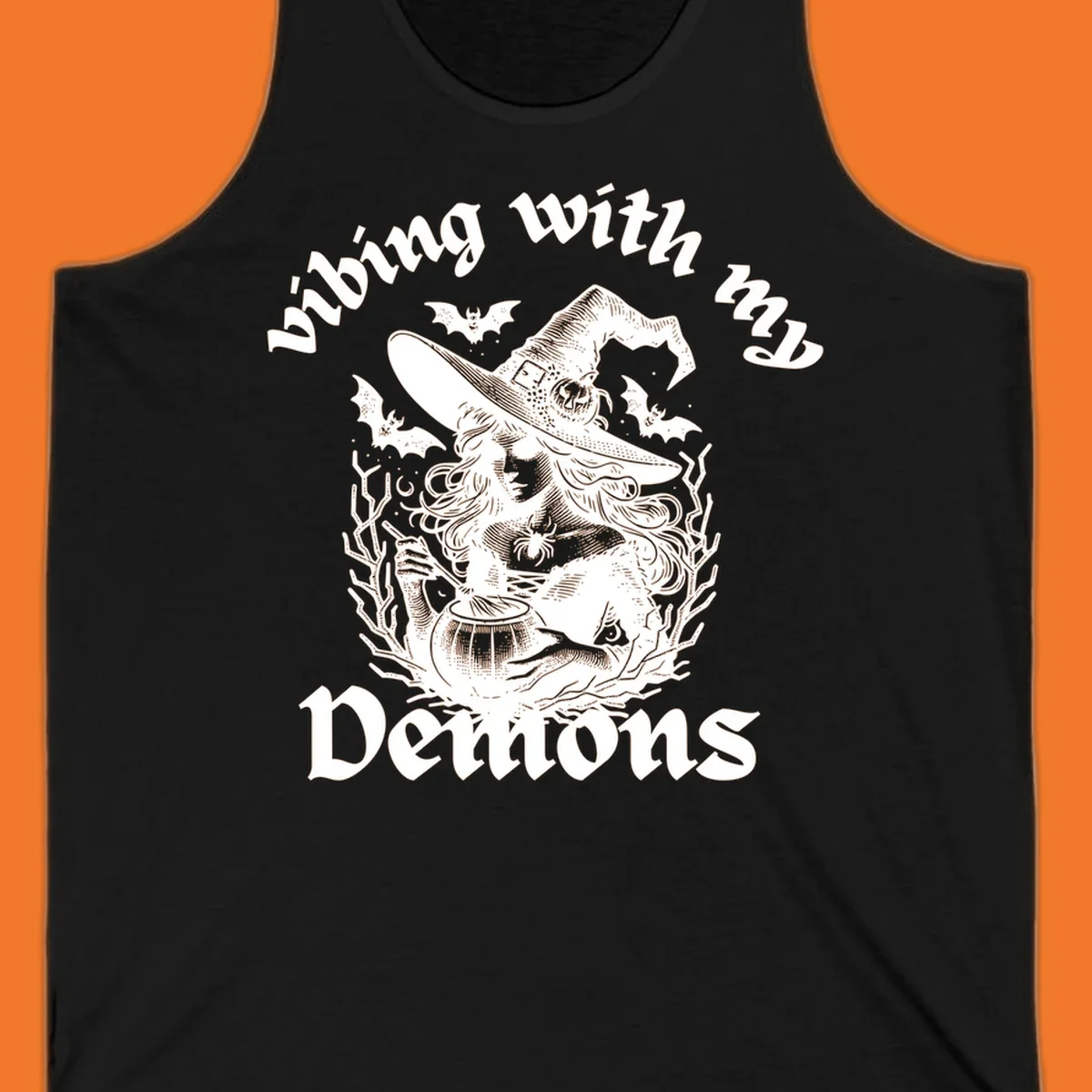 Witch stirring cauldron with bats and text 'vibing with my Demons', witch-vibing-demons design