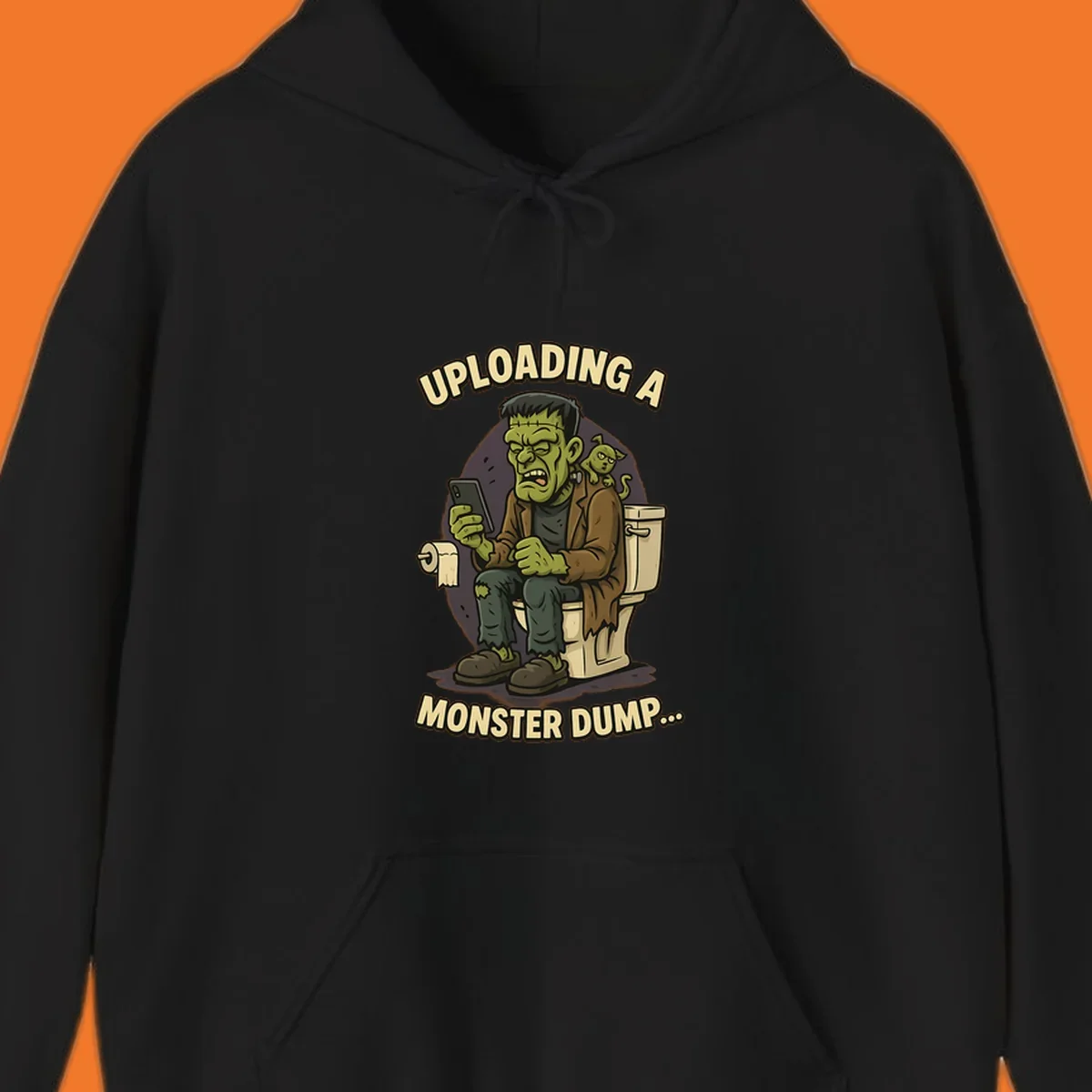 Frankenstein monster on toilet using phone with text uploading a monster dump, Halloween design.