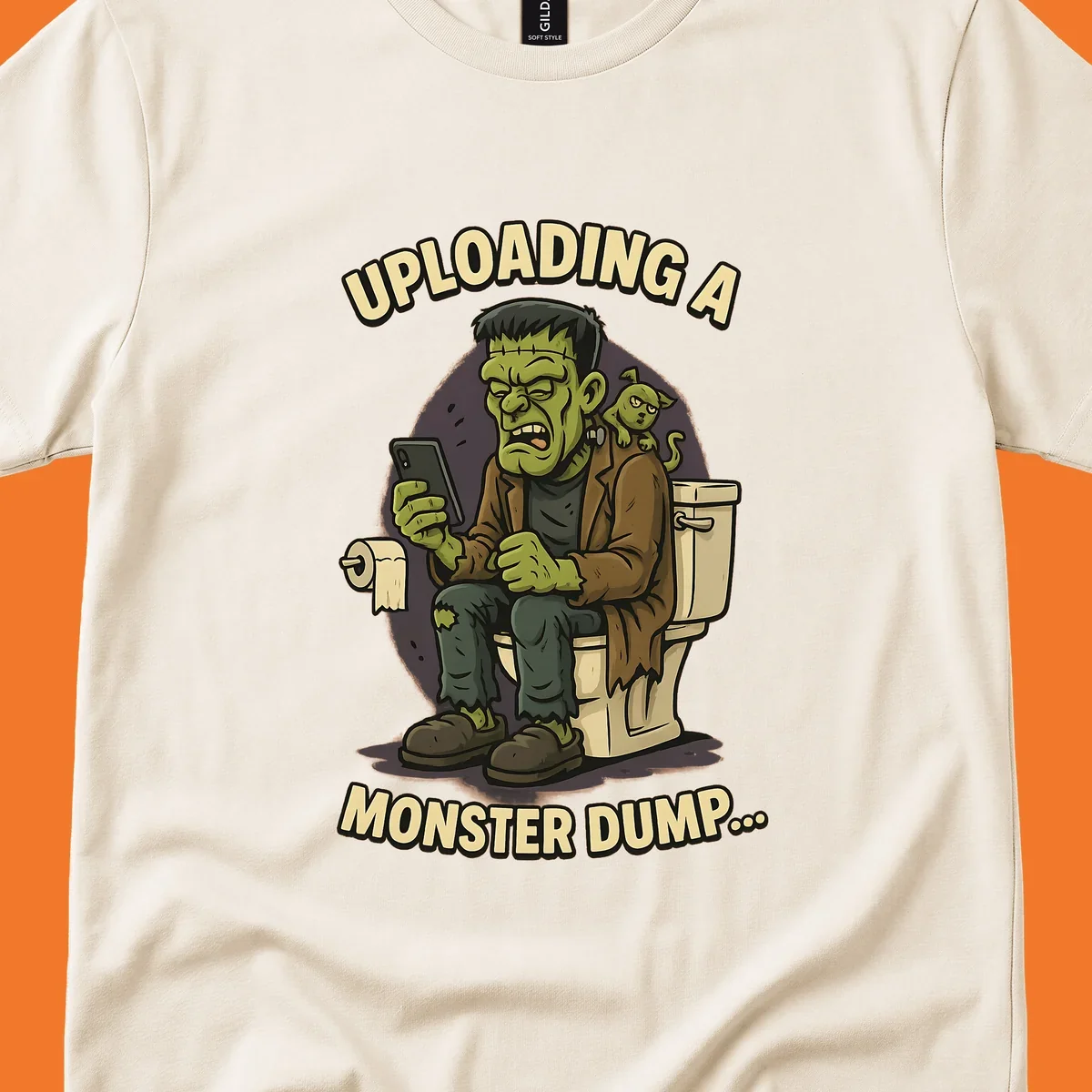 Frankenstein monster on toilet using phone with text uploading a monster dump, Halloween design.