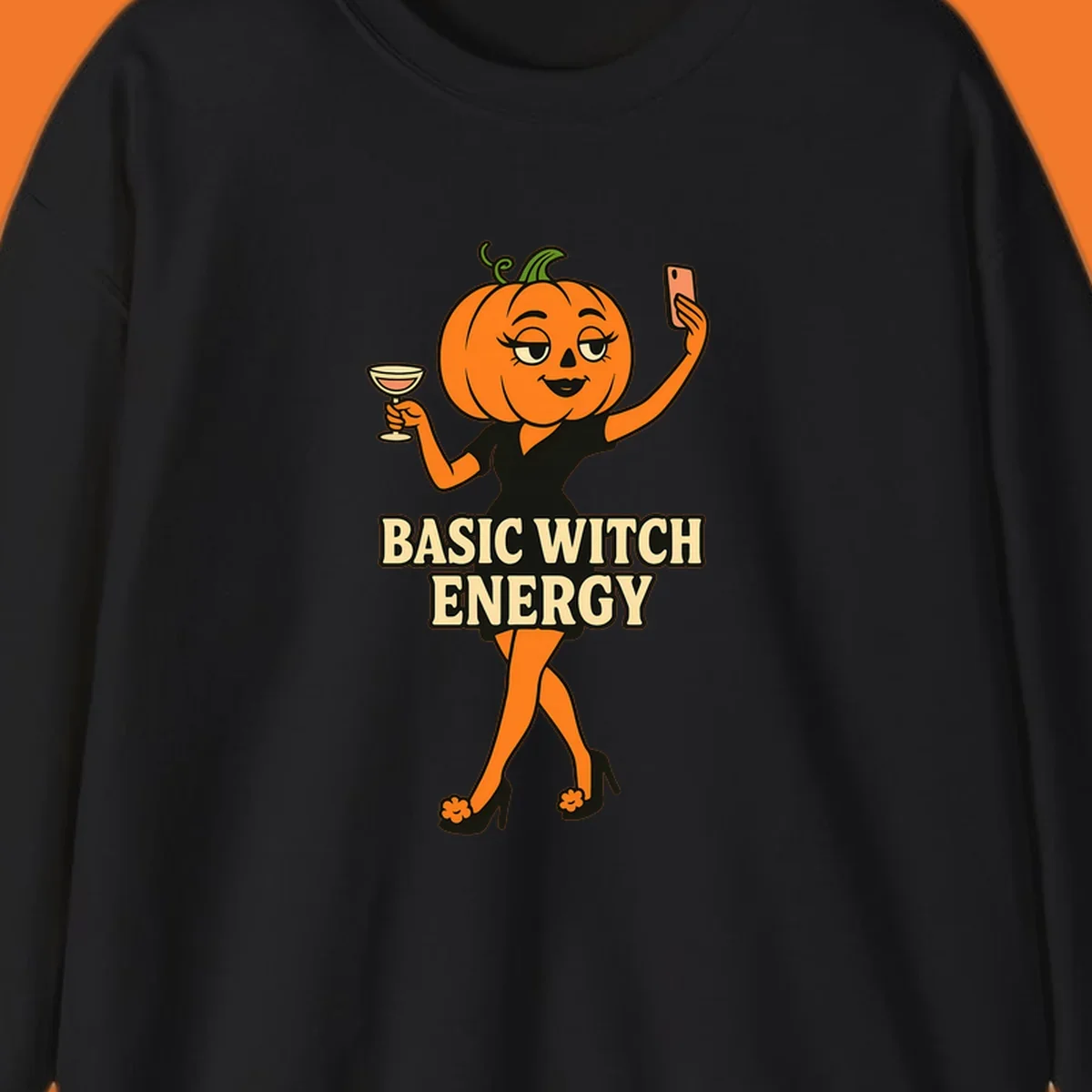 Pumpkin character with 'BASIC WITCH ENERGY' text, holding a cocktail and phone for a selfie.