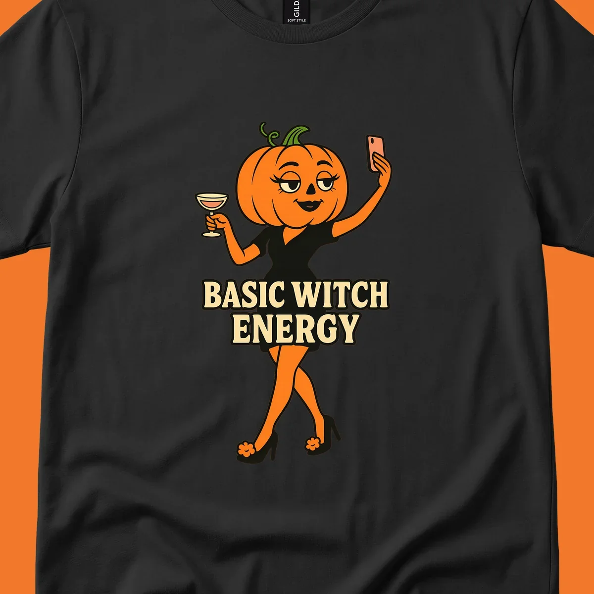Pumpkin character with 'BASIC WITCH ENERGY' text, holding a cocktail and phone for a selfie.