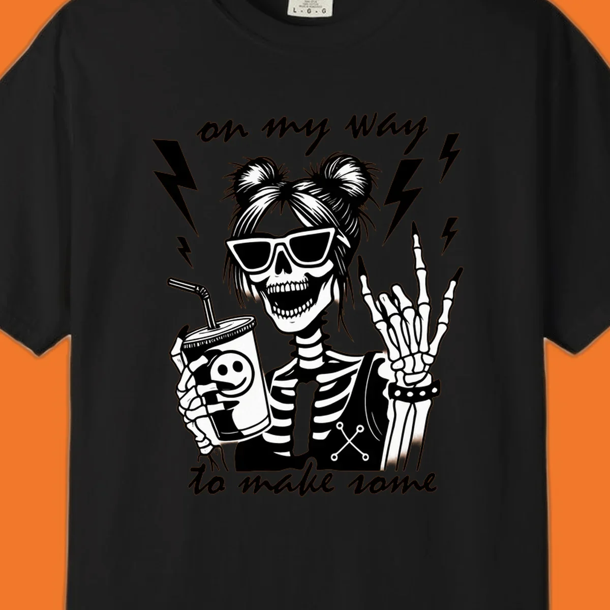 Skeleton with sunglasses and drink making rock-on gesture, text 'on my way to make some', lightning bolts. Skeleton party time.