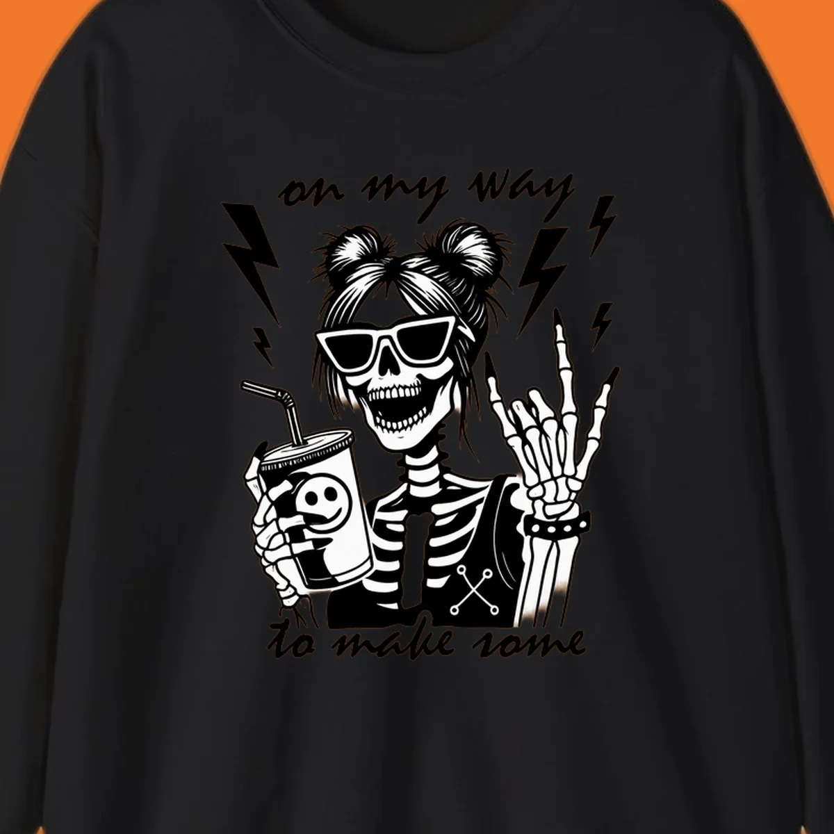 Skeleton with sunglasses and drink making rock-on gesture, text 'on my way to make some', lightning bolts. Skeleton party time.