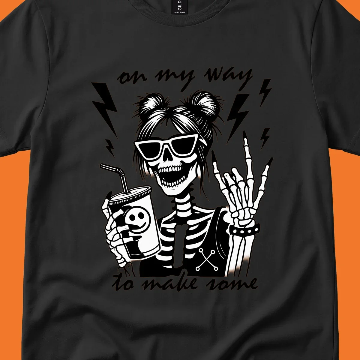 Skeleton with sunglasses and drink making rock-on gesture, text 'on my way to make some', lightning bolts. Skeleton party time.