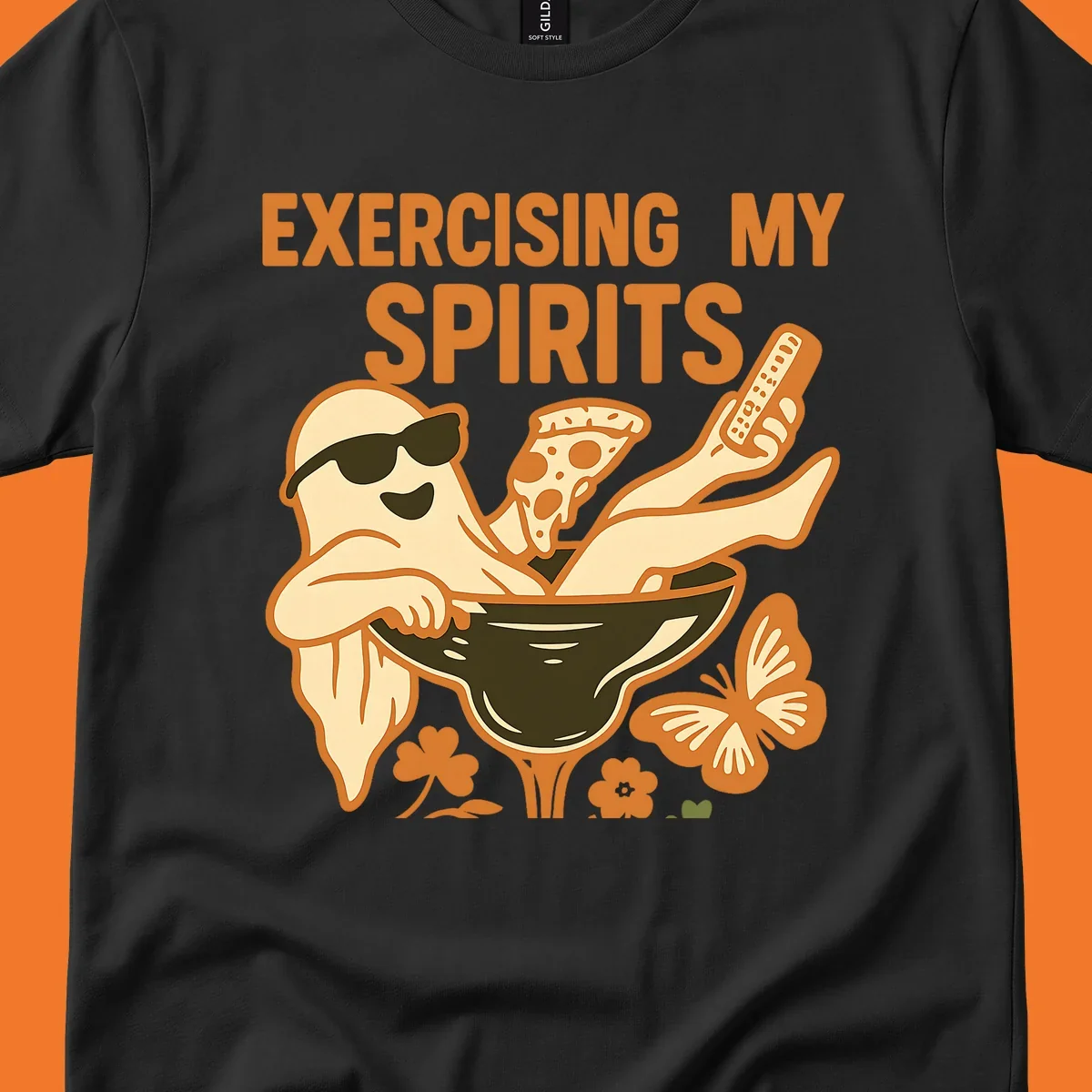 Ghost relaxing in cocktail glass with pizza and remote, text Exercising My Spirits. This design is great for Halloween.