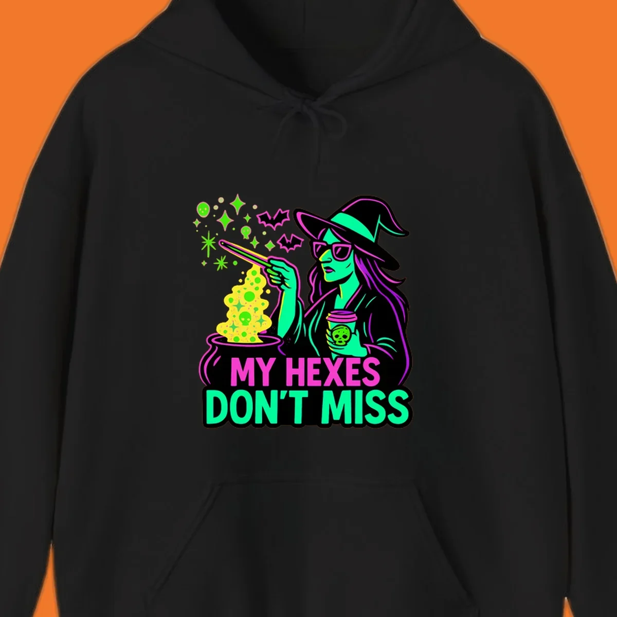 Witch with coffee and cauldron, text 'My Hexes Don't Miss'