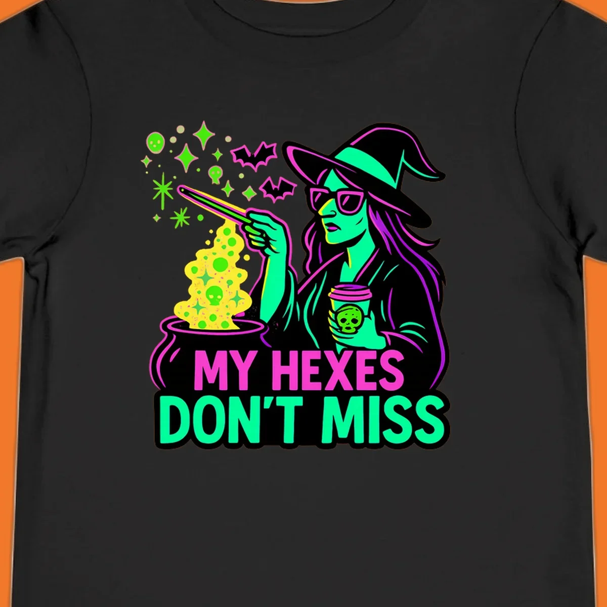 Witch with coffee and cauldron, text 'My Hexes Don't Miss'
