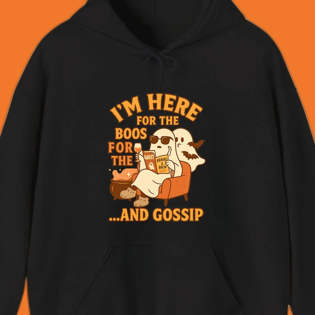 Illustration of ghosts relaxing and reading, with text "I'm Here For The Boos And Gossip", for ghost-gossip-halloween themed apparel.