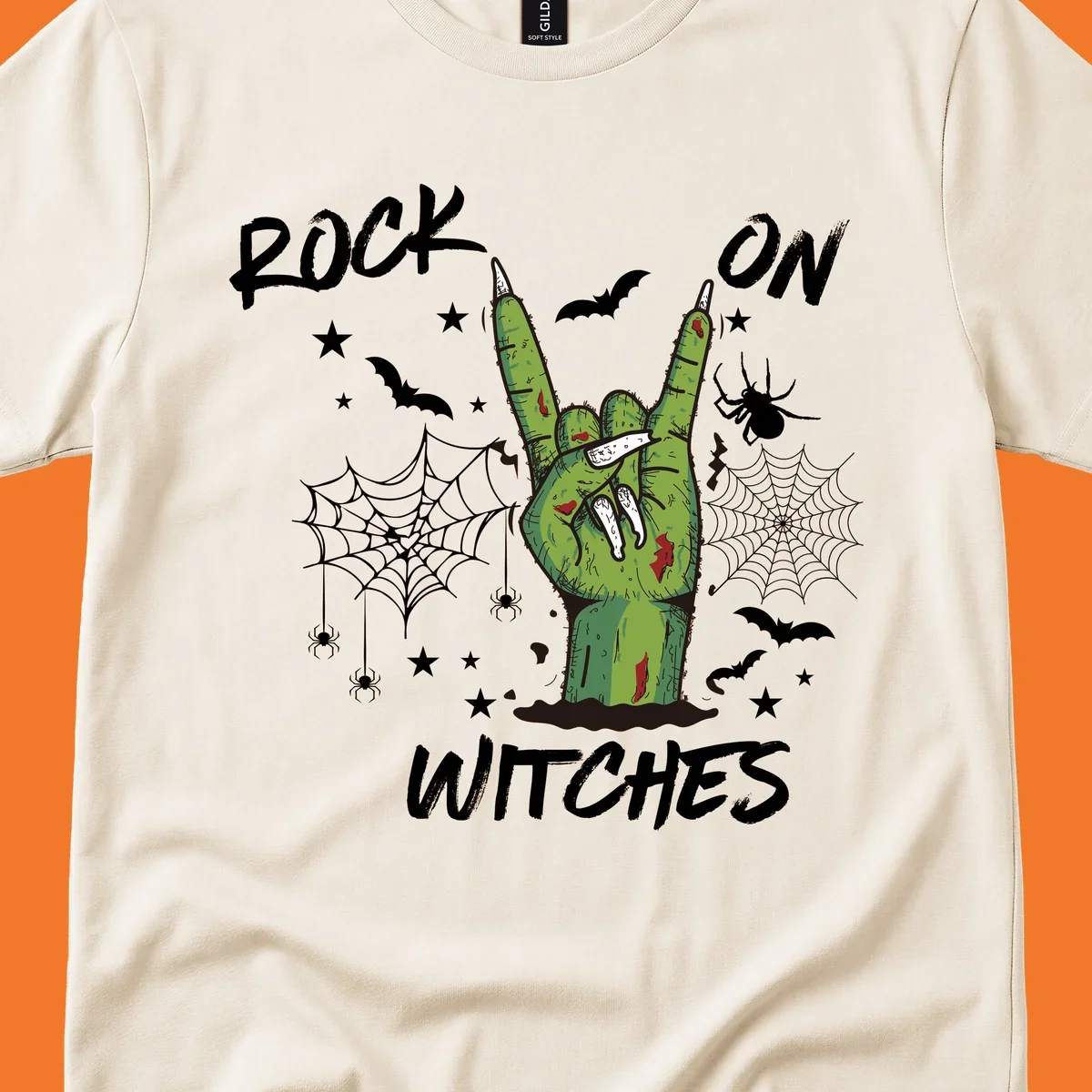 Zombie hand making rock on gesture with bats, spiders, and text 'ROCK ON WITCHES'.