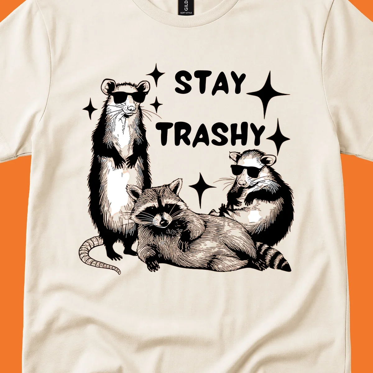 Stay trashy gang of raccoons and opossum wearing sunglasses with sparkles illustration.