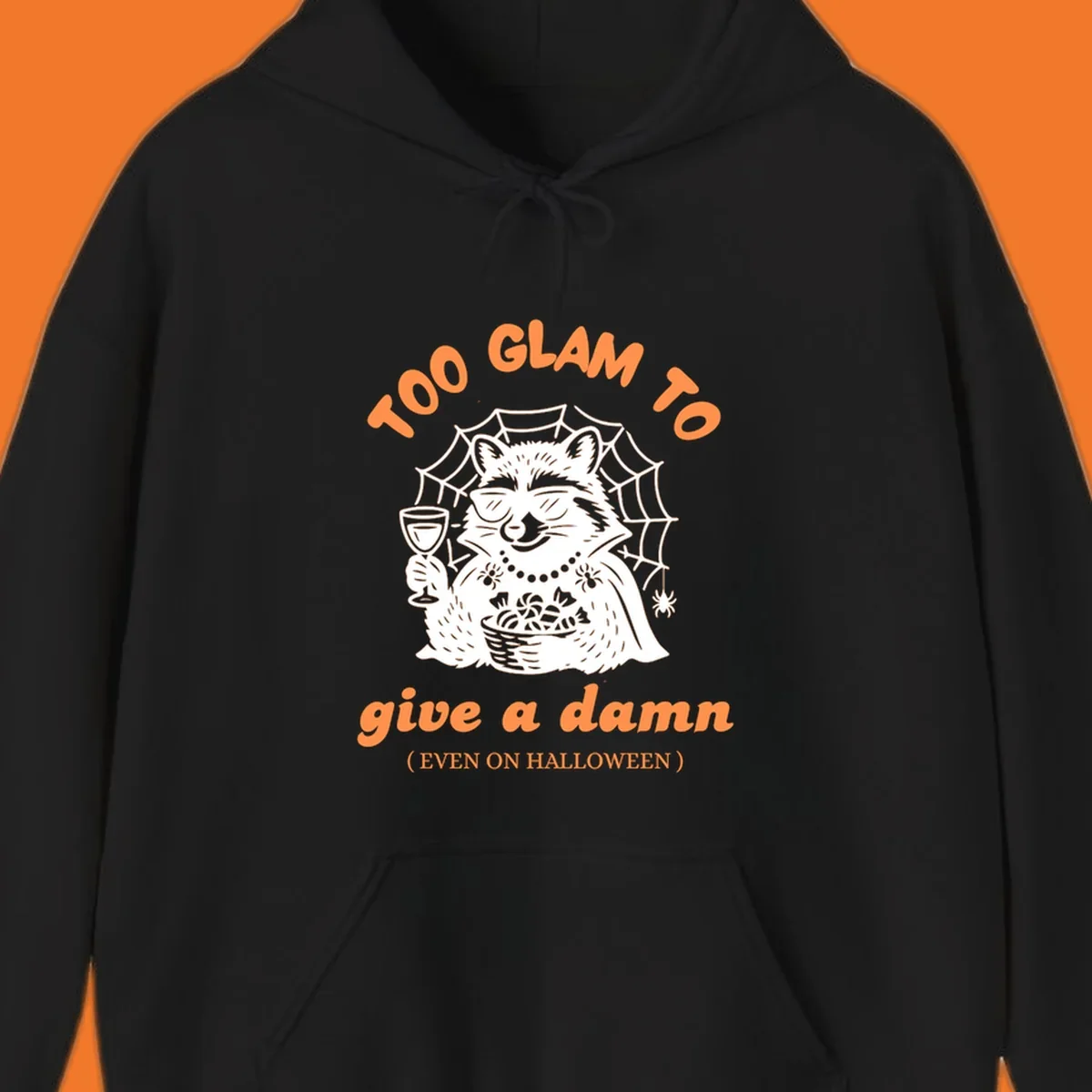 Glam raccoon with sunglasses and wine, 'Too Glam To Give A Damn' text for Halloween.