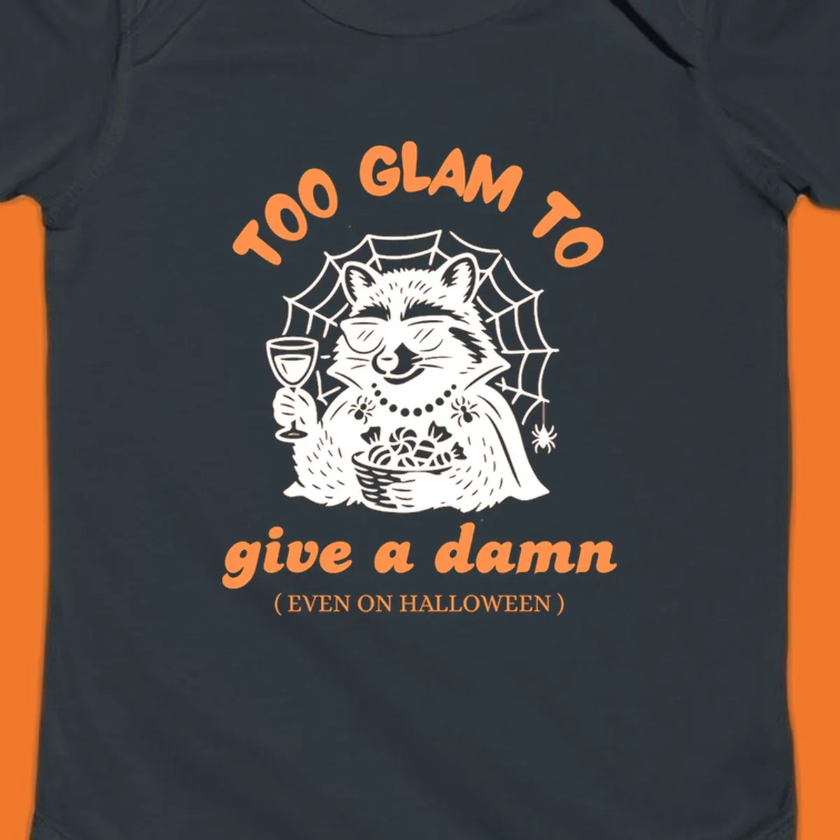 Glam raccoon with sunglasses and wine, 'Too Glam To Give A Damn' text for Halloween.