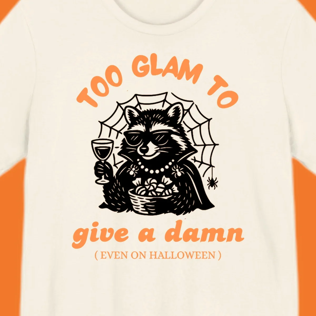 Glam raccoon with sunglasses and wine, 'Too Glam To Give A Damn' text for Halloween.