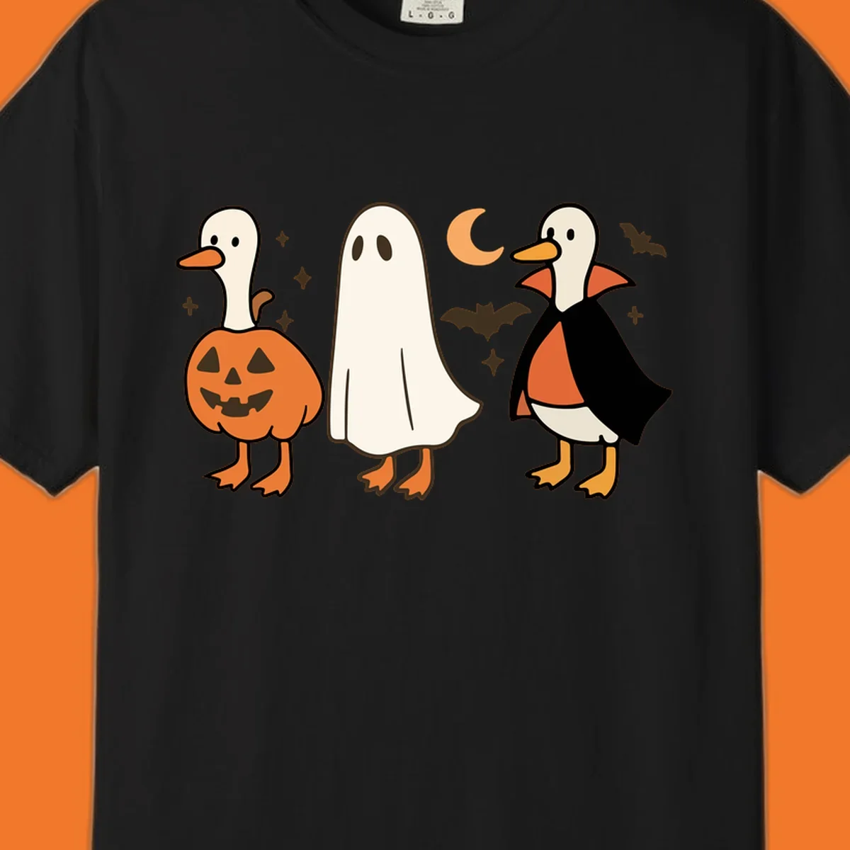 Halloween duck costumes: pumpkin, ghost, and vampire, with moon and bats. Halloween-duck-costumes.