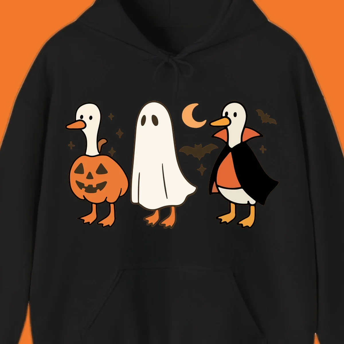 Halloween duck costumes: pumpkin, ghost, and vampire, with moon and bats. Halloween-duck-costumes.