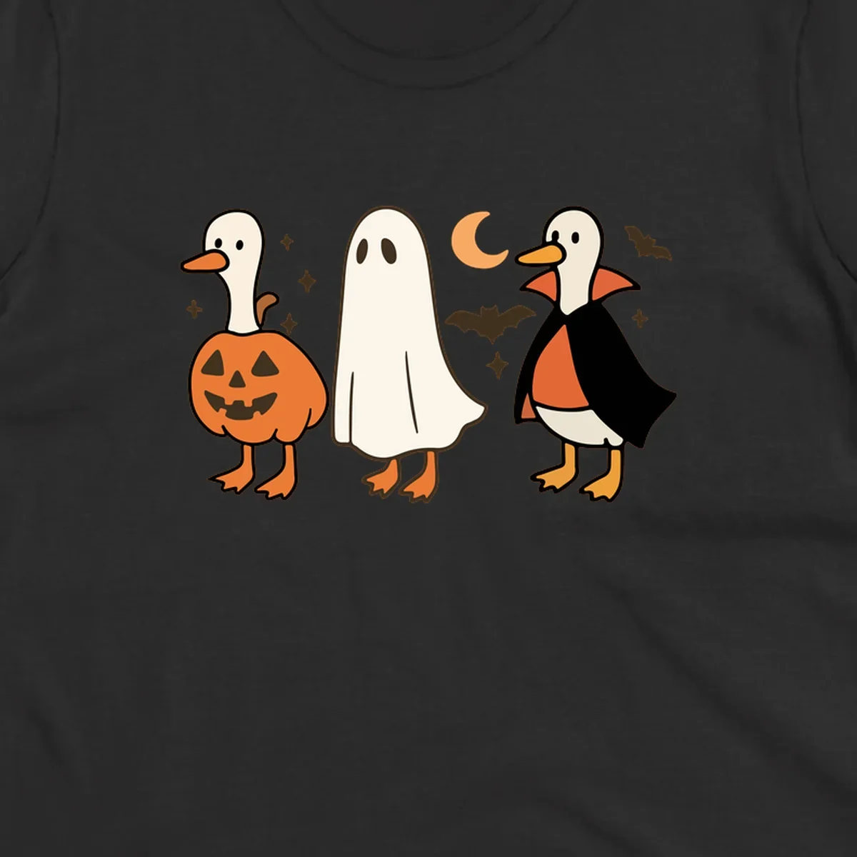 Halloween duck costumes: pumpkin, ghost, and vampire, with moon and bats. Halloween-duck-costumes.