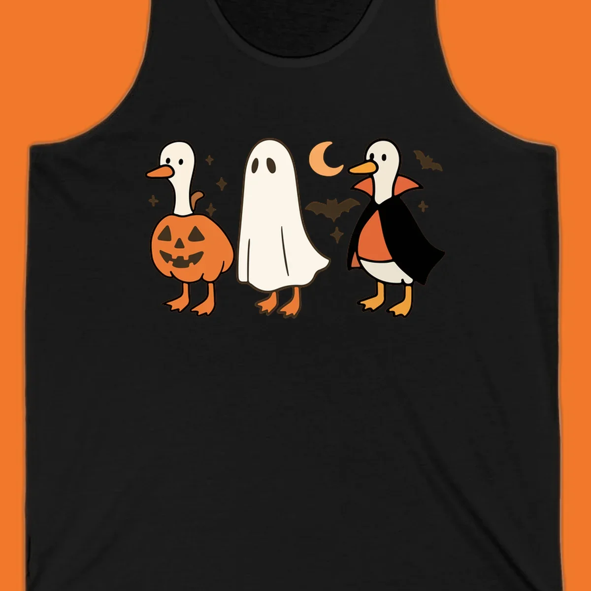 Halloween duck costumes: pumpkin, ghost, and vampire, with moon and bats. Halloween-duck-costumes.