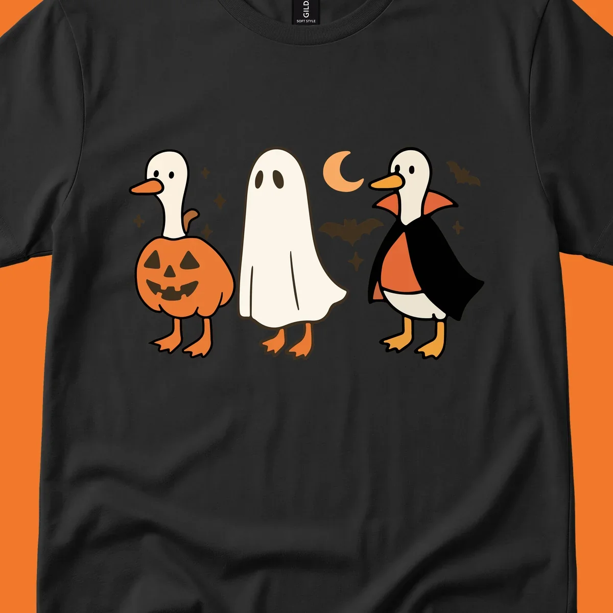 Halloween duck costumes: pumpkin, ghost, and vampire, with moon and bats. Halloween-duck-costumes.