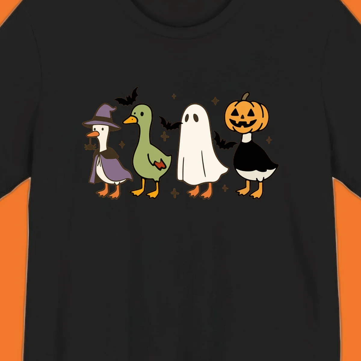 Illustration of four cute animals in Halloween costumes: a witch goose, a duckling, a ghost, and a pumpkin goose.