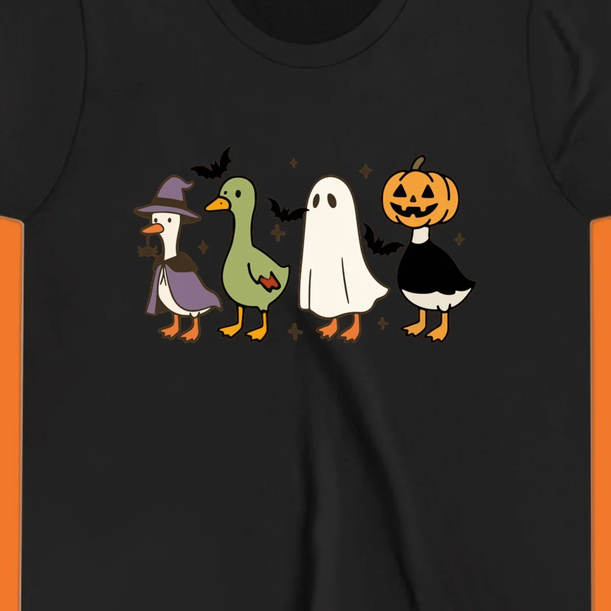 Illustration of four cute animals in Halloween costumes: a witch goose, a duckling, a ghost, and a pumpkin goose.