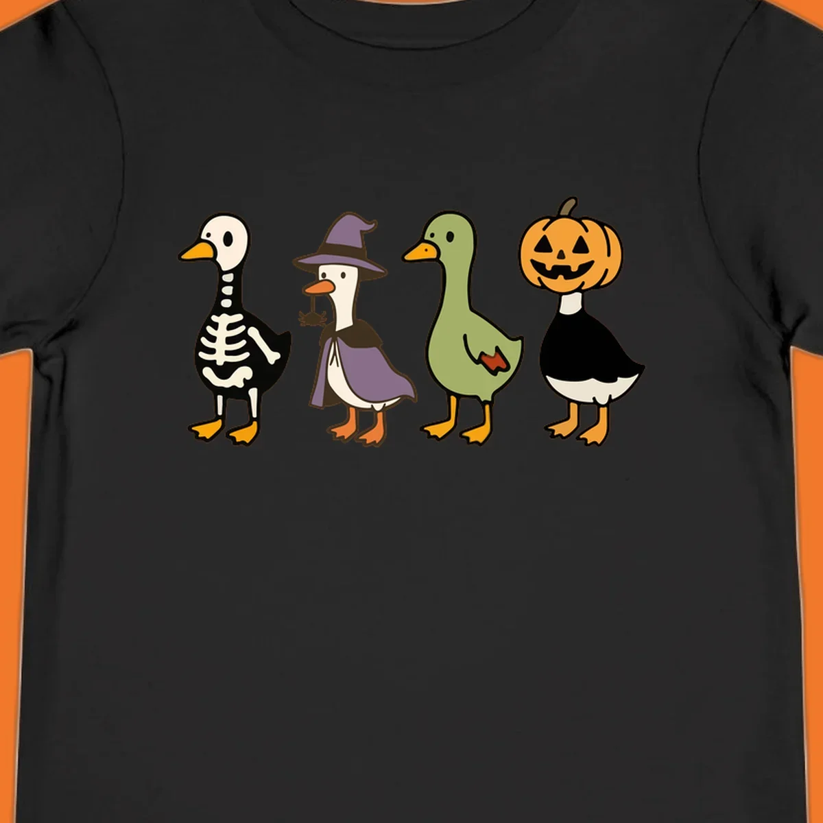 Four ducks in Halloween costumes: skeleton, witch, plain, and jack-o-lantern. Funny Halloween duck costumes.