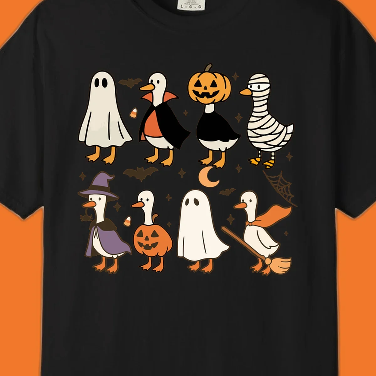Illustration of cute ducks in various Halloween costumes like ghost, vampire, and pumpkin, on a dark background.