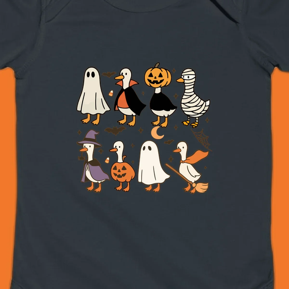 Illustration of cute ducks in various Halloween costumes like ghost, vampire, and pumpkin, on a dark background.