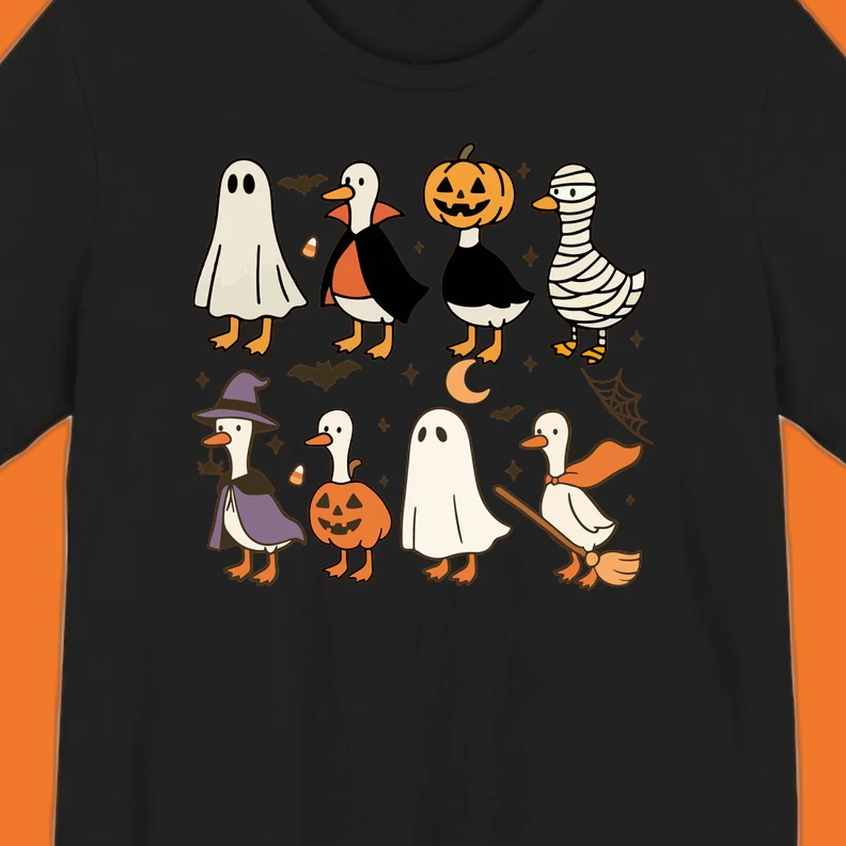 Illustration of cute ducks in various Halloween costumes like ghost, vampire, and pumpkin, on a dark background.