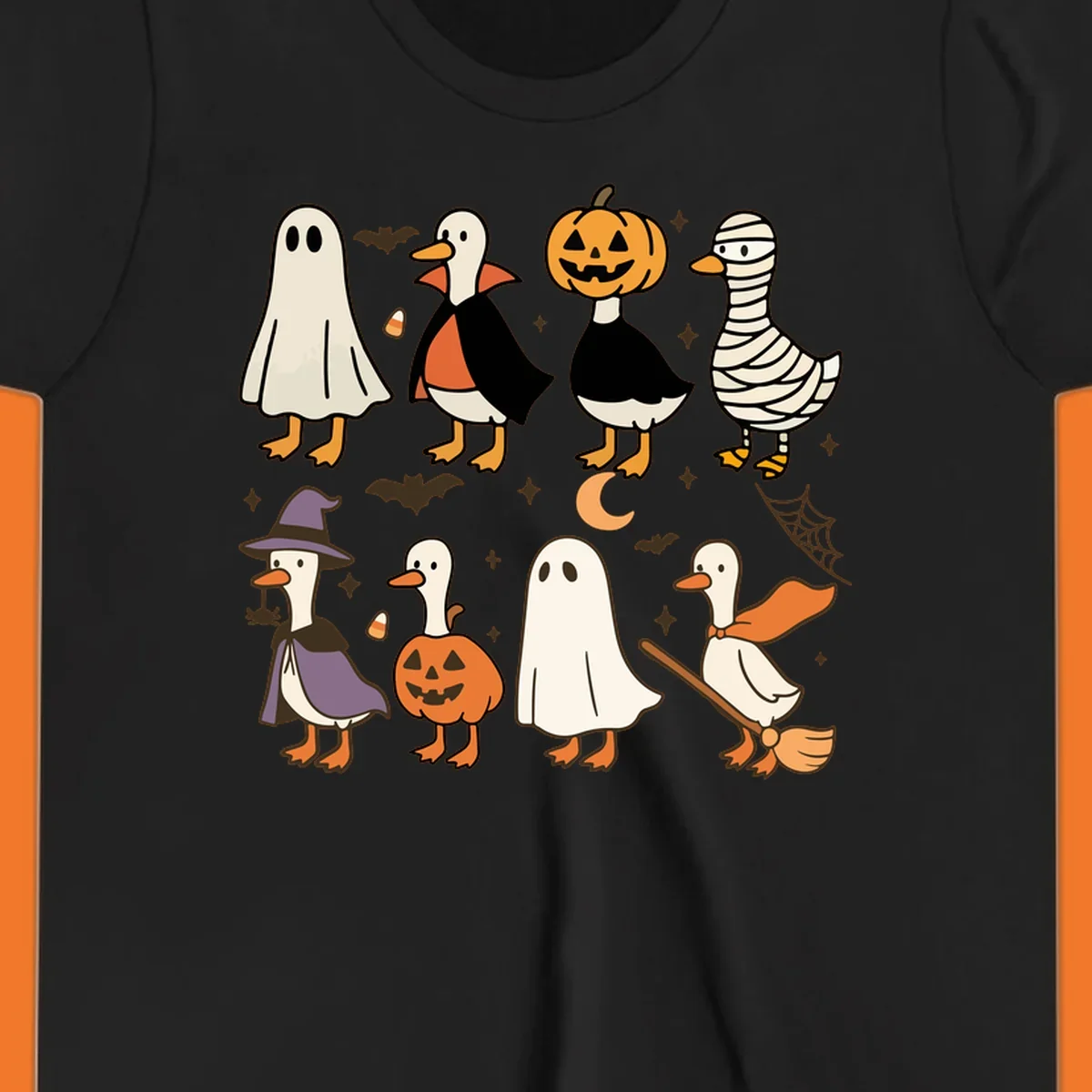 Illustration of cute ducks in various Halloween costumes like ghost, vampire, and pumpkin, on a dark background.
