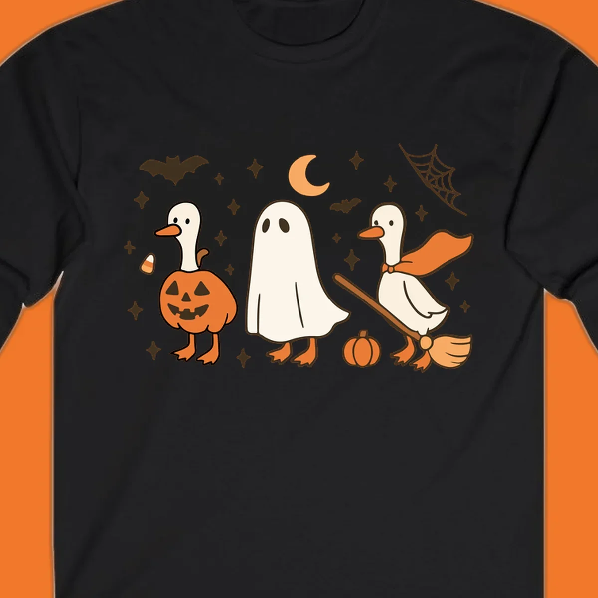 Cute geese in Halloween costumes: pumpkin, ghost, and witch on broom, with bats and stars.