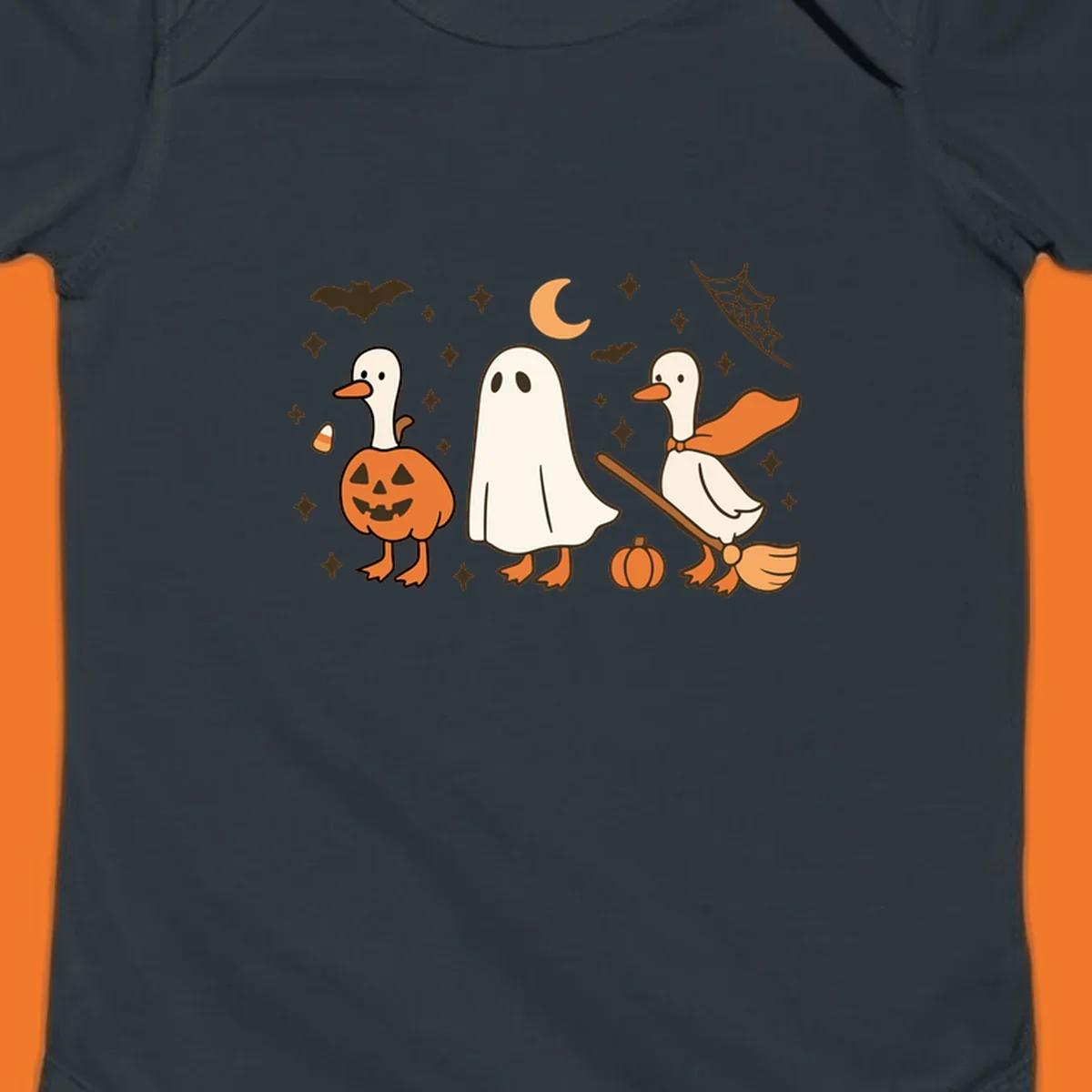 Cute geese in Halloween costumes: pumpkin, ghost, and witch on broom, with bats and stars.