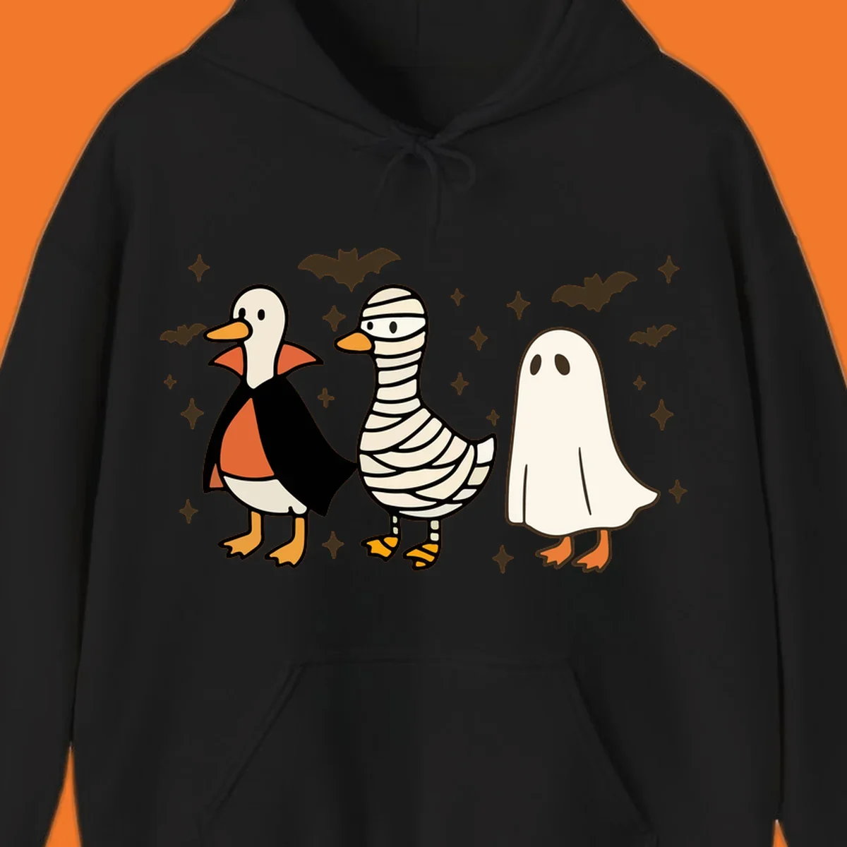 Halloween duck trio in costumes: vampire, mummy, and ghost. holiday-duck-trio.