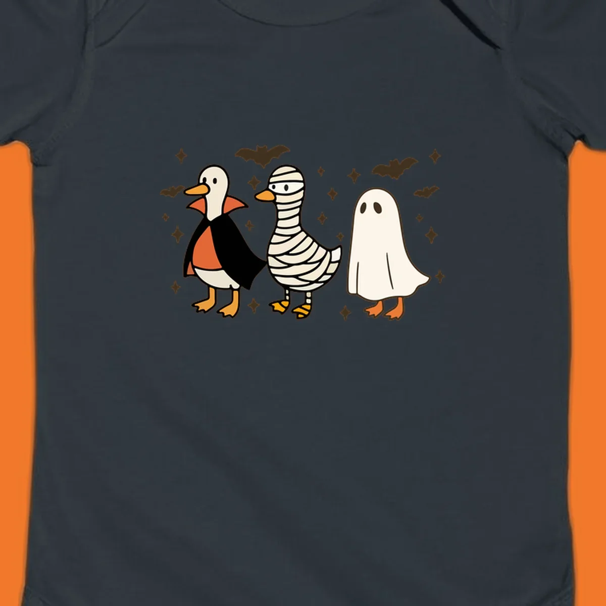 Halloween duck trio in costumes: vampire, mummy, and ghost. holiday-duck-trio.