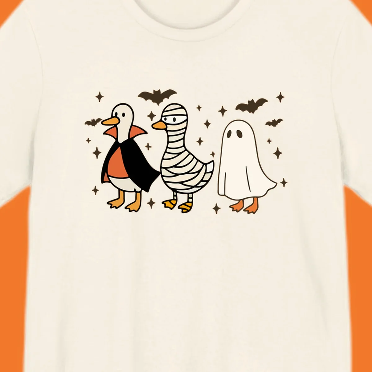 Halloween duck trio in costumes: vampire, mummy, and ghost. holiday-duck-trio.