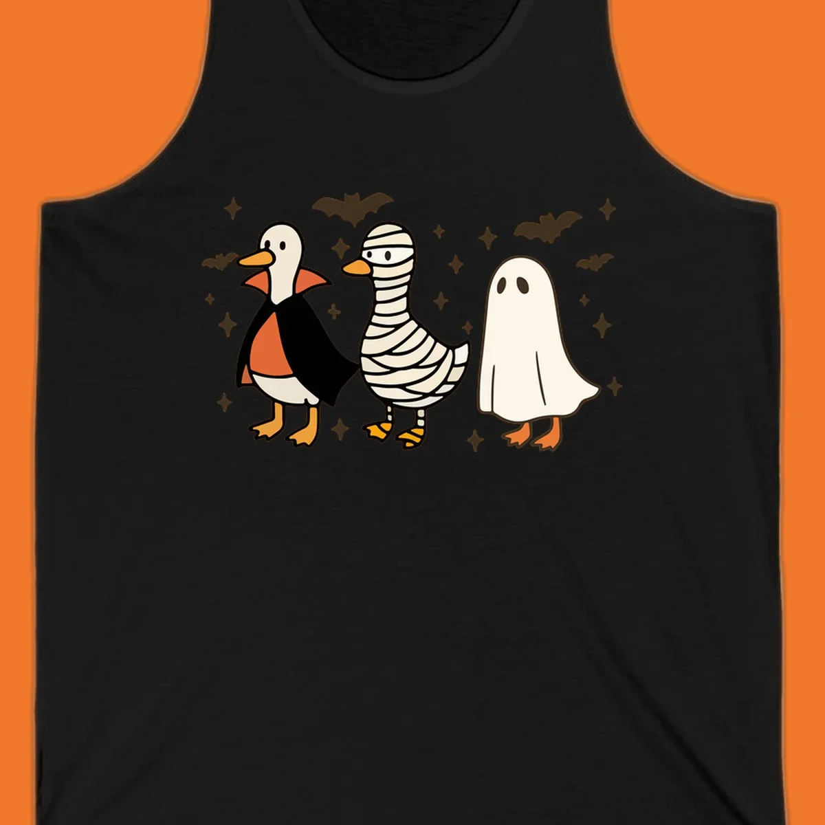 Halloween duck trio in costumes: vampire, mummy, and ghost. holiday-duck-trio.