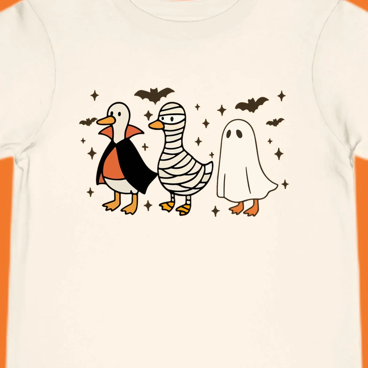 Halloween duck trio in costumes: vampire, mummy, and ghost. holiday-duck-trio.