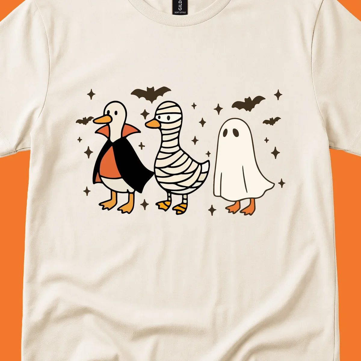 Halloween duck trio in costumes: vampire, mummy, and ghost. holiday-duck-trio.